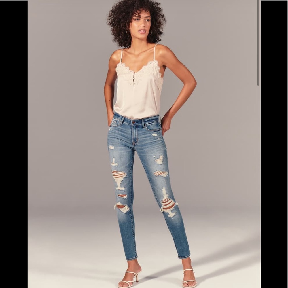 Ripped Medium Wash Mid Rise Super Skinny Jeans